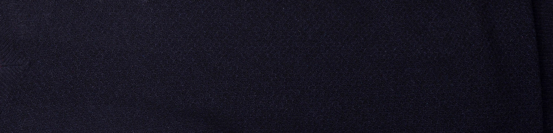 Granatowy sweter elegancki - tkanina